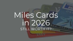 A collection of credit cards featuring "miles cards" alongside the text, "Still worth it in 2026?" for consumer consideration.