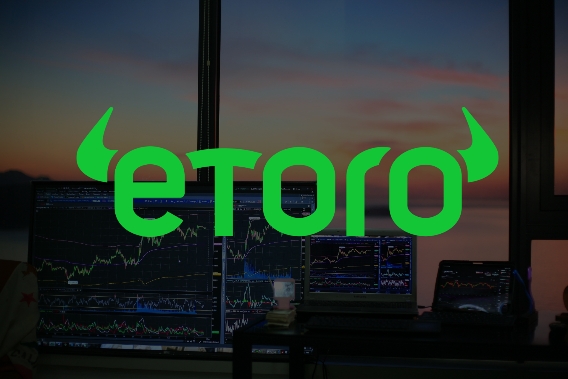 Trading desk with multiple monitors showing stock charts; large bright green 'elon' logo overlaying the screen.