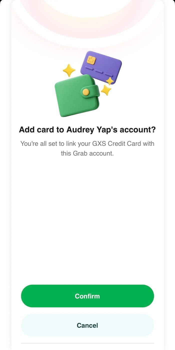 Grab app prompt to add the GXS Credit Card to the Grab account with a Confirm button