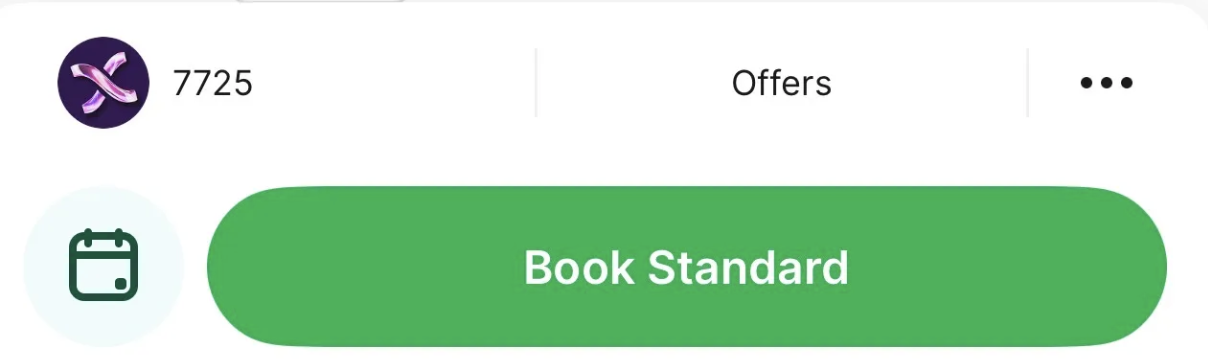 Grab booking screen with the GXS Credit Card selected as payment method before tapping Book Standard