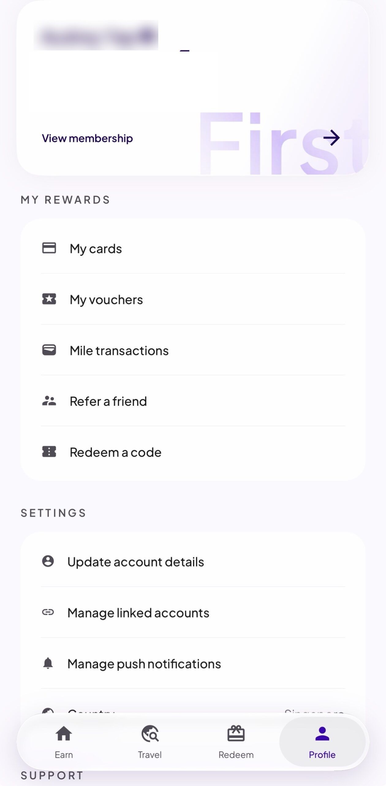 HeyMax Profile tab with Redeem a code at the bottom of the My Rewards list