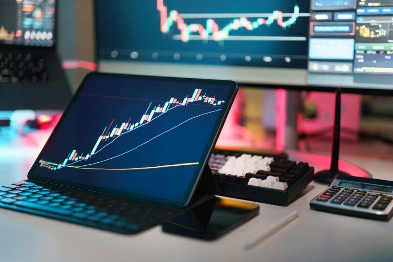 stocks on ipad and laptop