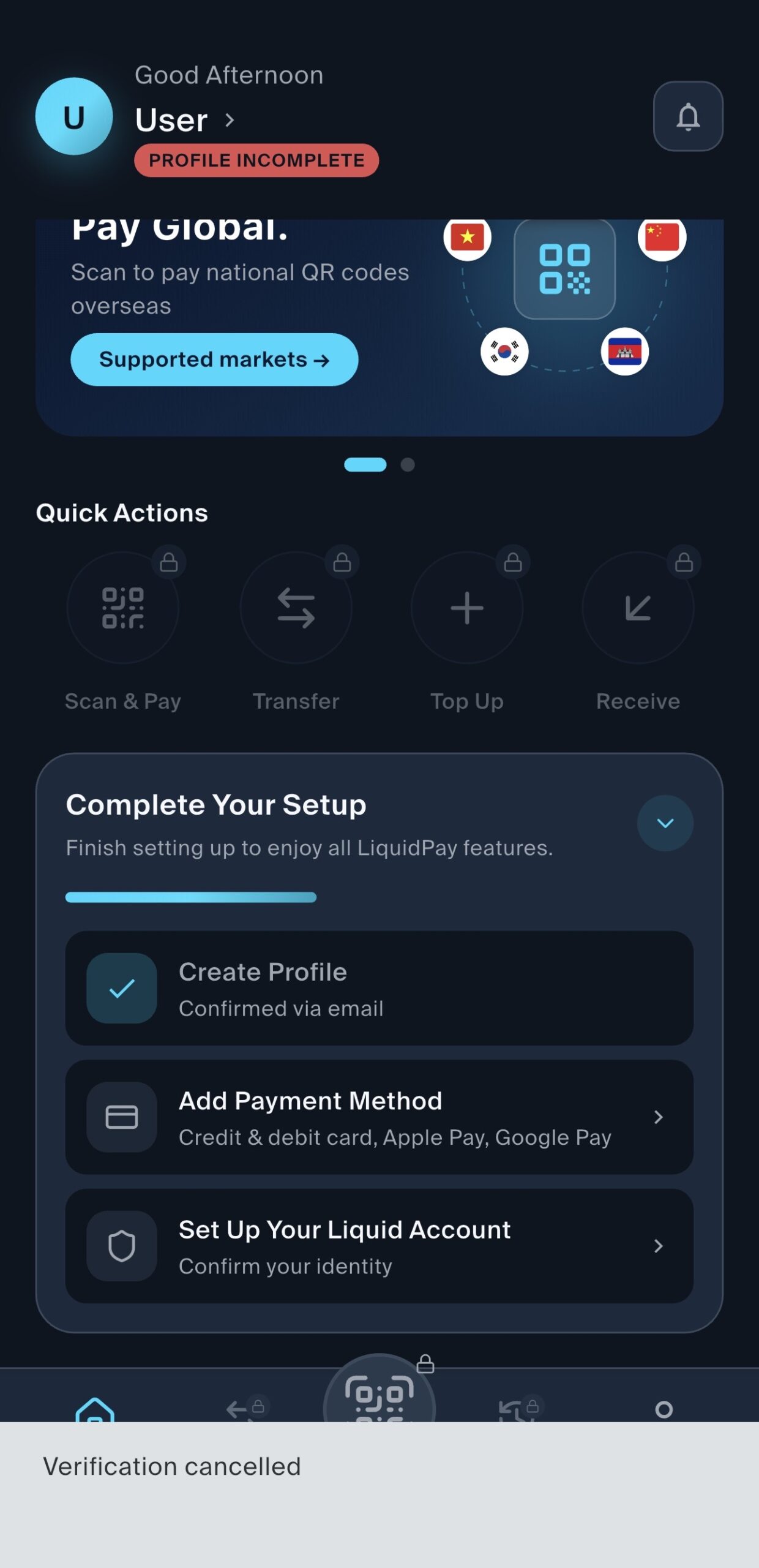 LiquidPay 2.0 Complete Your Setup screen with identity verification step and a Verification cancelled message