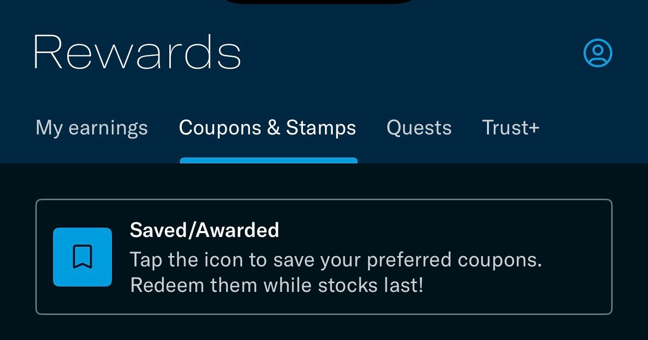 Trust app Rewards screen with the Coupons and Stamps tab selected, showing the Saved and Awarded section